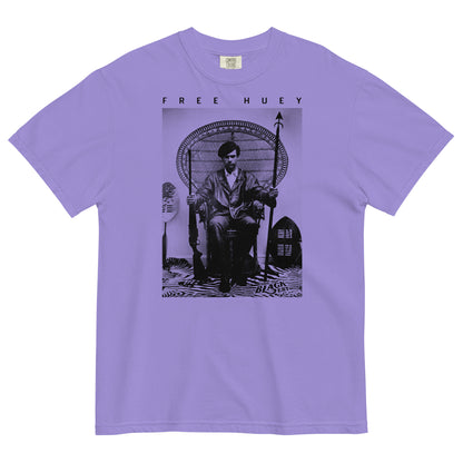 a purple t shirt with a picture of huey p newton sitting on a wicker chair