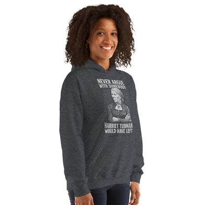 Woman wearing Never Argue Harriet Tubman Would Have Left Pullover Unisex Hoodie in dark gray, ideal for cold weather and protest fashion.