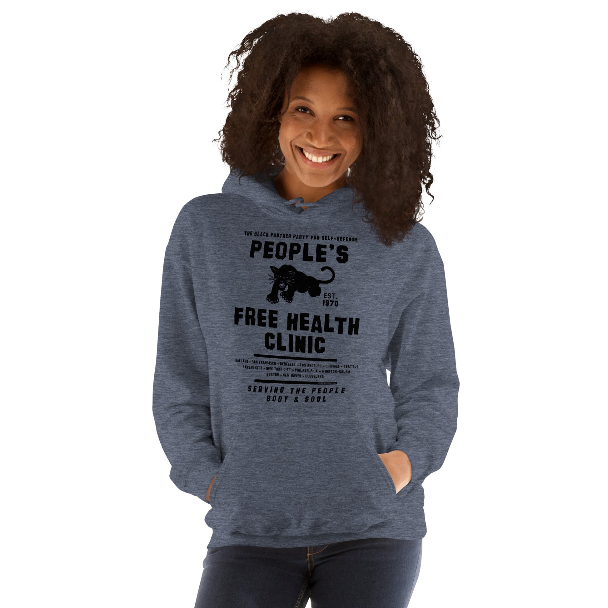 Woman smiling in People's Free Health Clinic gray hoodie