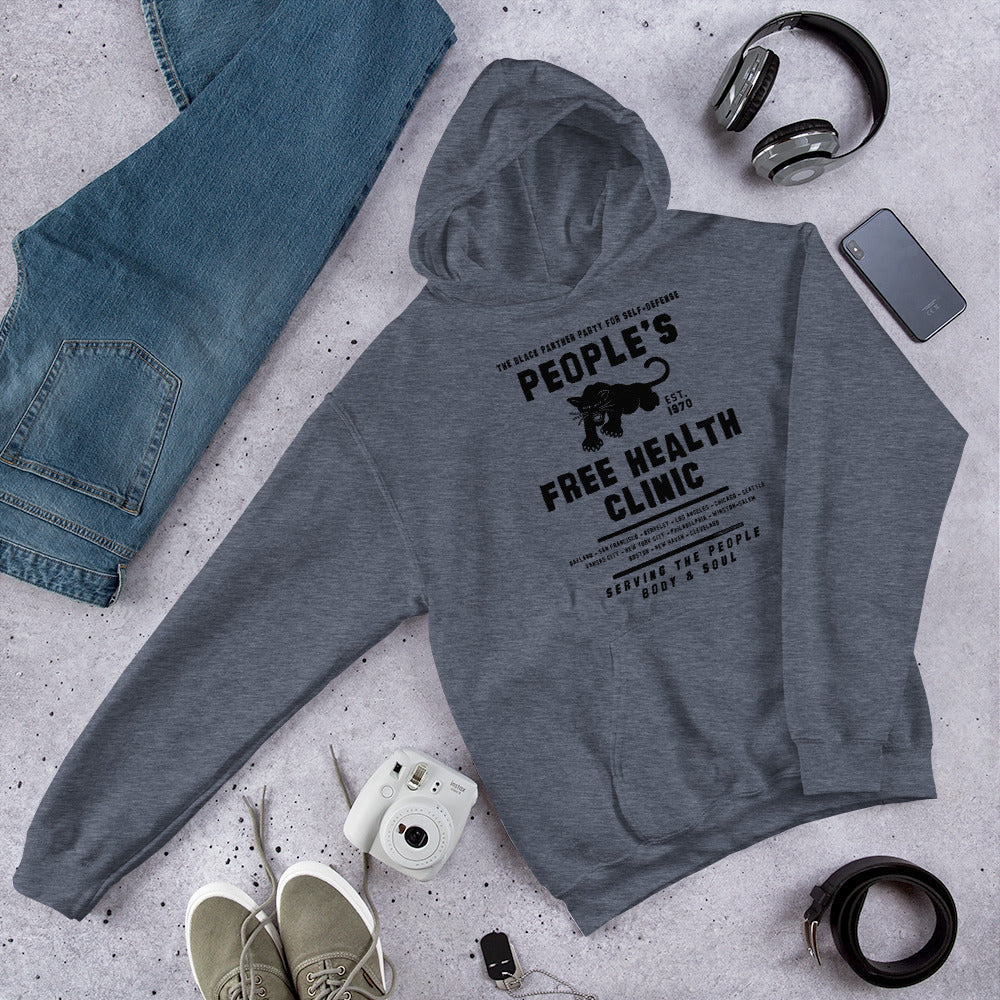 Flat lay of gray hoodie with accessories