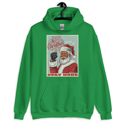 Green Black Santa Stay Woke Unisex Hoodie on hanger, combining festive color with empowering holiday design for cultural representation.