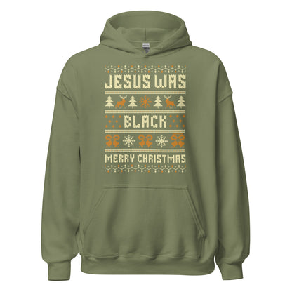 Sage green Jesus Was Black Merry Christmas Unisex Hoodie by TheBlackest Co., soft and bold hoodie for winter comfort and holiday pride.