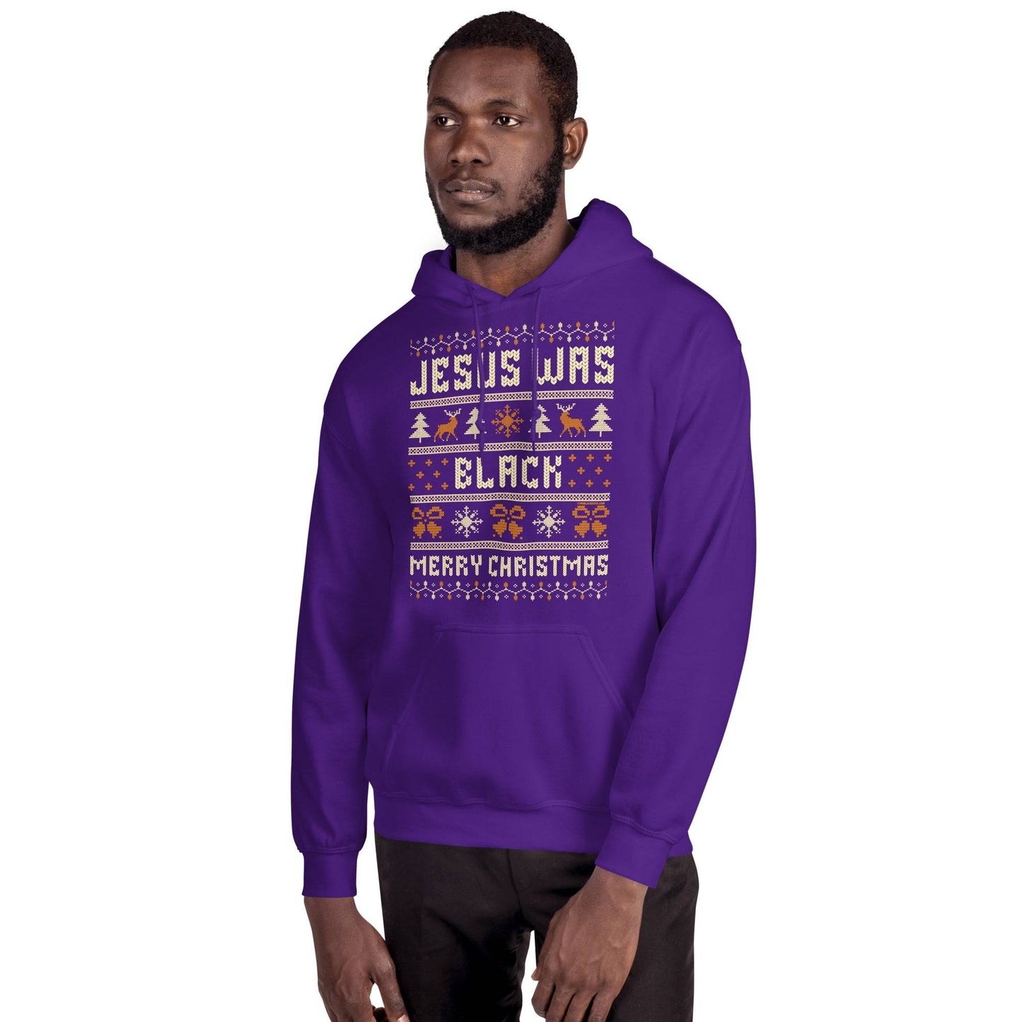 Man modeling purple Jesus Was Black Merry Christmas Unisex Hoodie by TheBlackest Co., a bold graphic pullover for festive cold weather wear.