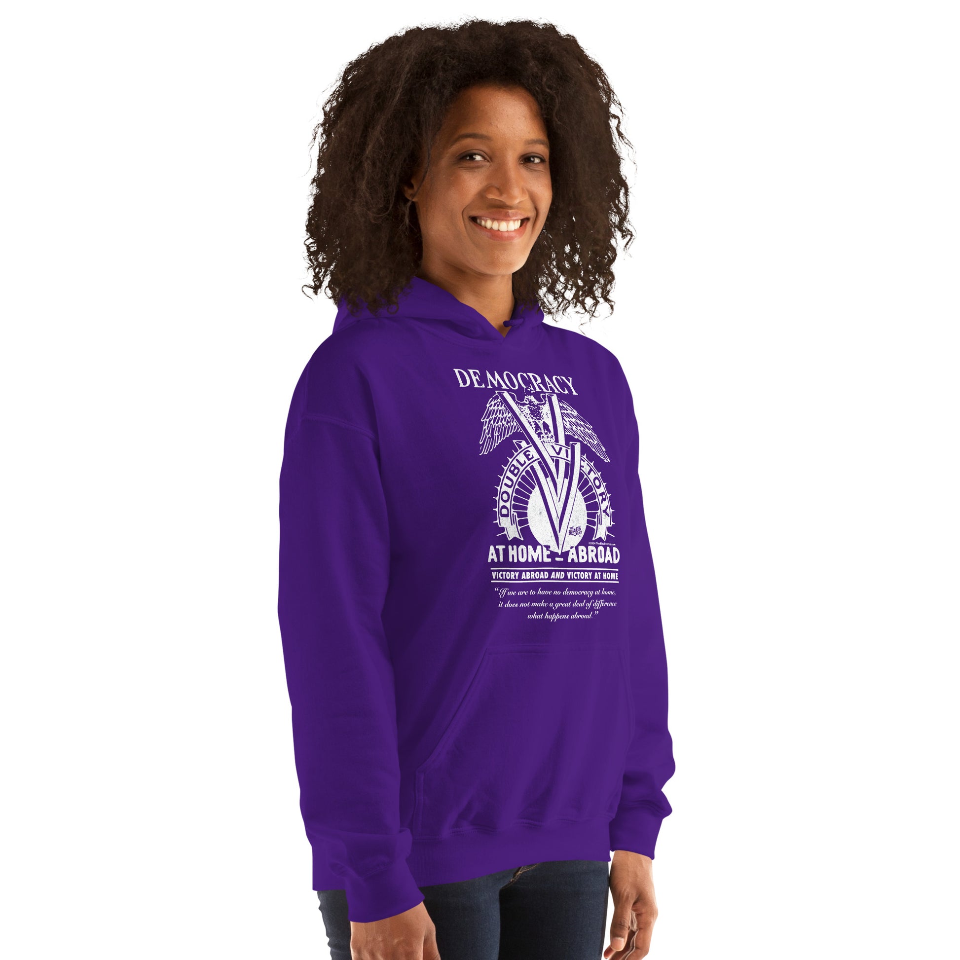 Woman wearing purple Double V Campaign WWII Black Soldiers Hoodie, showcasing vintage-style print celebrating Black military history.