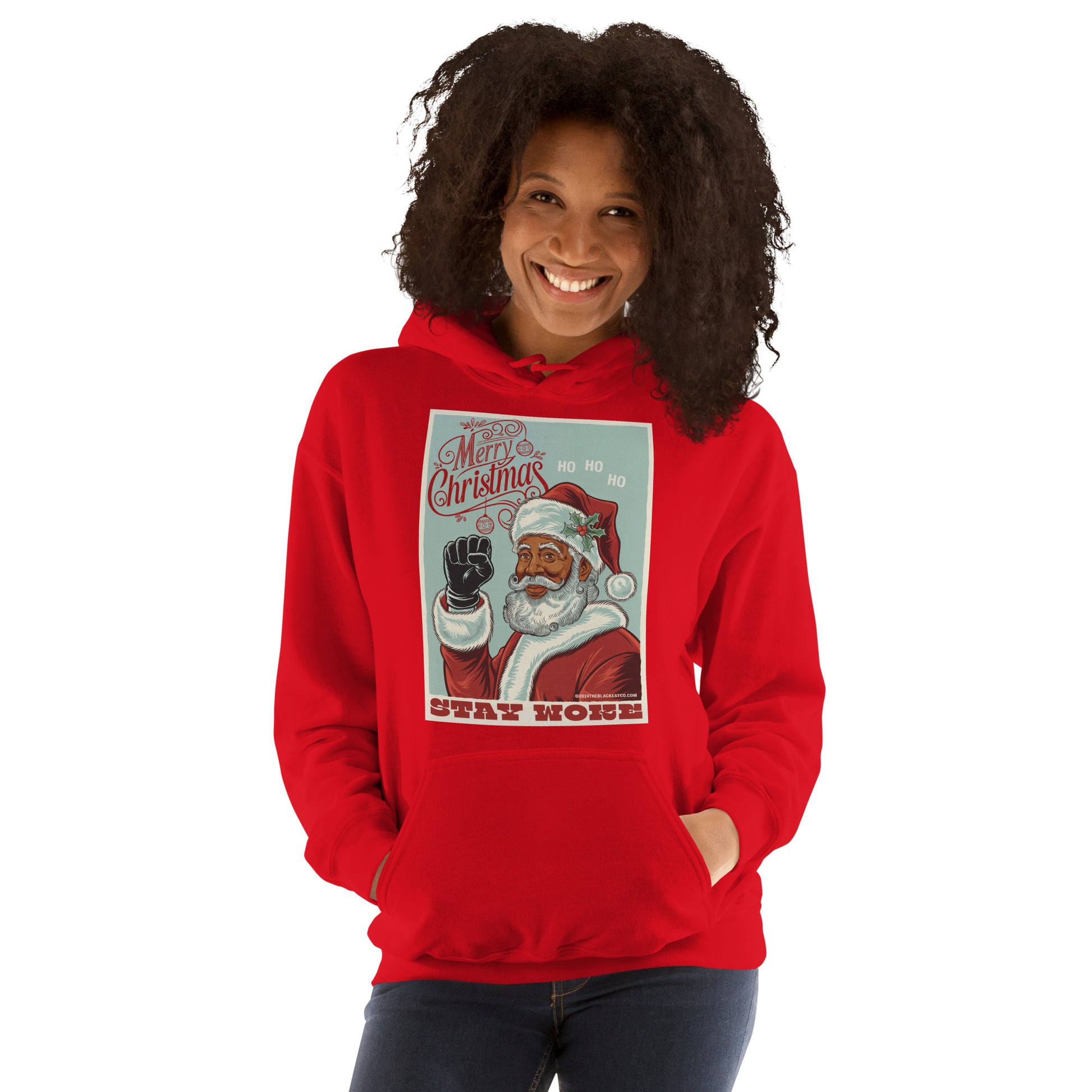 Smiling woman wearing Black Santa Stay Woke Unisex Hoodie in red, showcasing festive and cultural holiday apparel for winter celebrations.