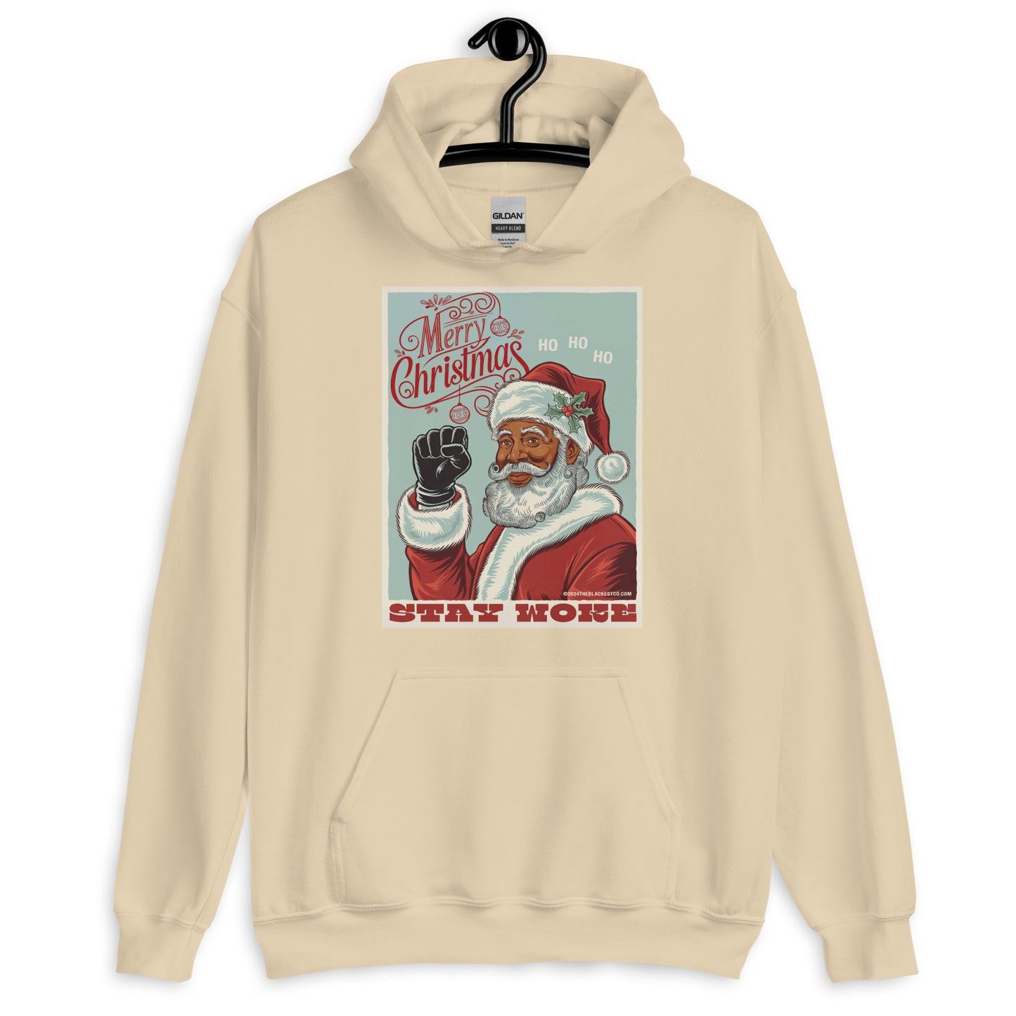 Cream Black Santa Stay Woke Unisex Hoodie on hanger, showcasing vintage Black Santa print and Stay Woke slogan for holiday gifting.