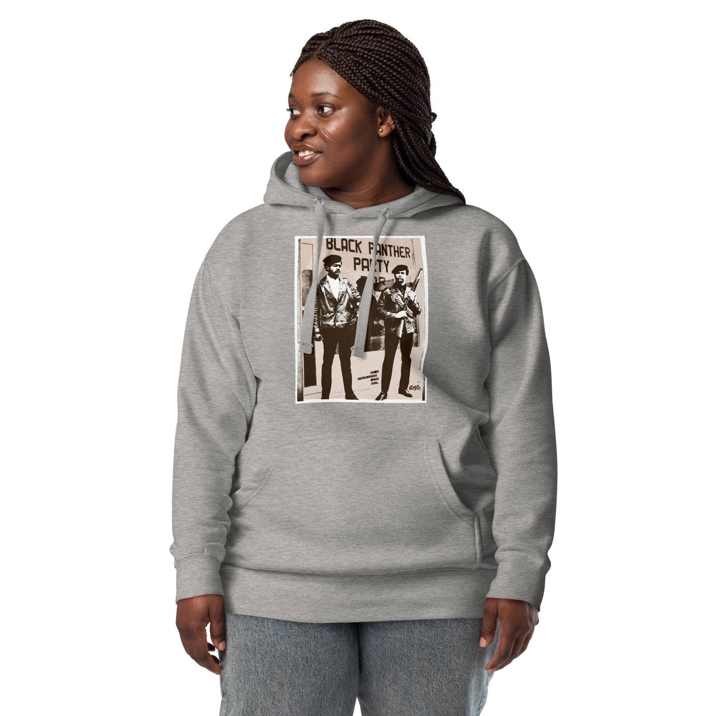 a woman wearing a grey hoodie with a picture of two men on it