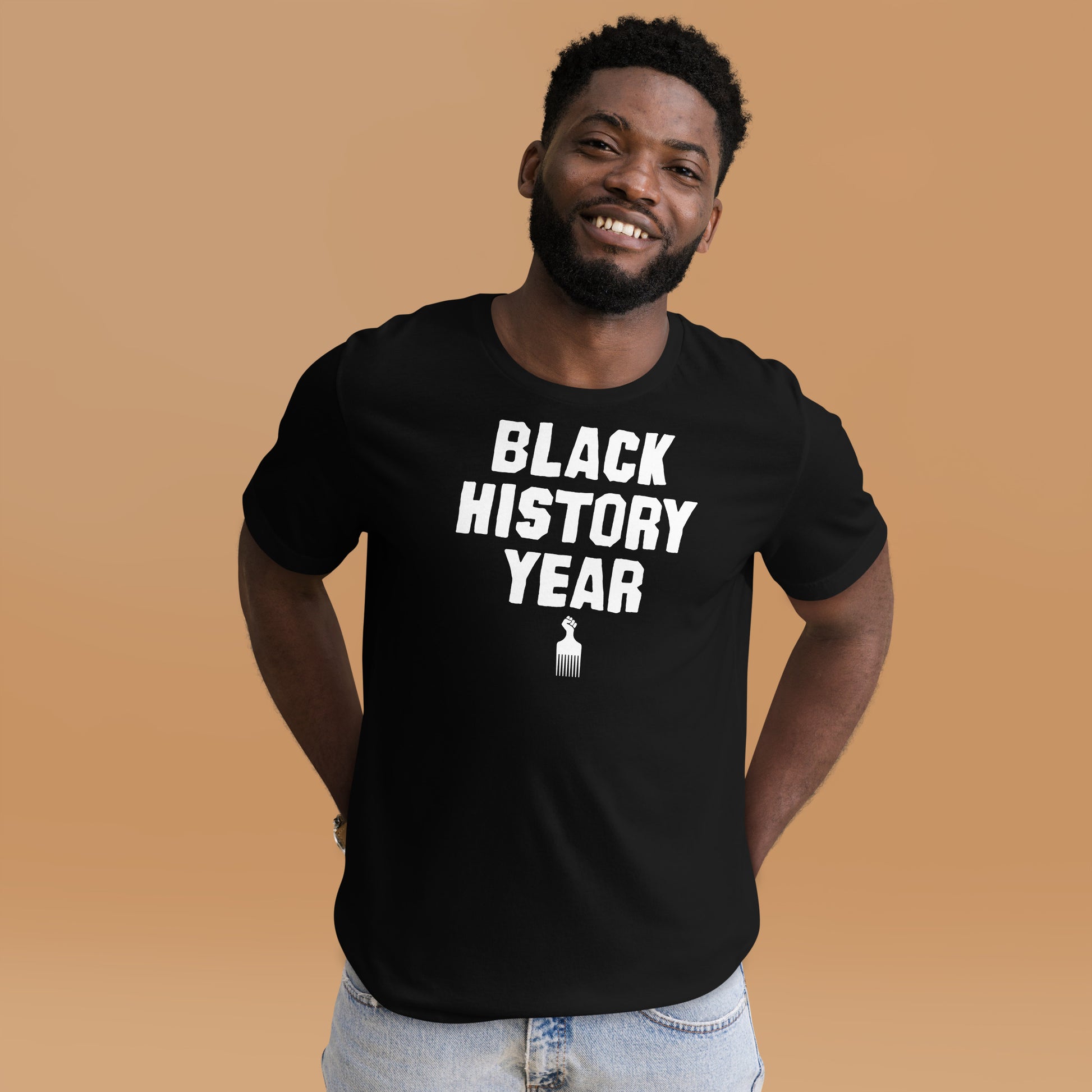 Smiling person wearing Black History Year T-Shirt.