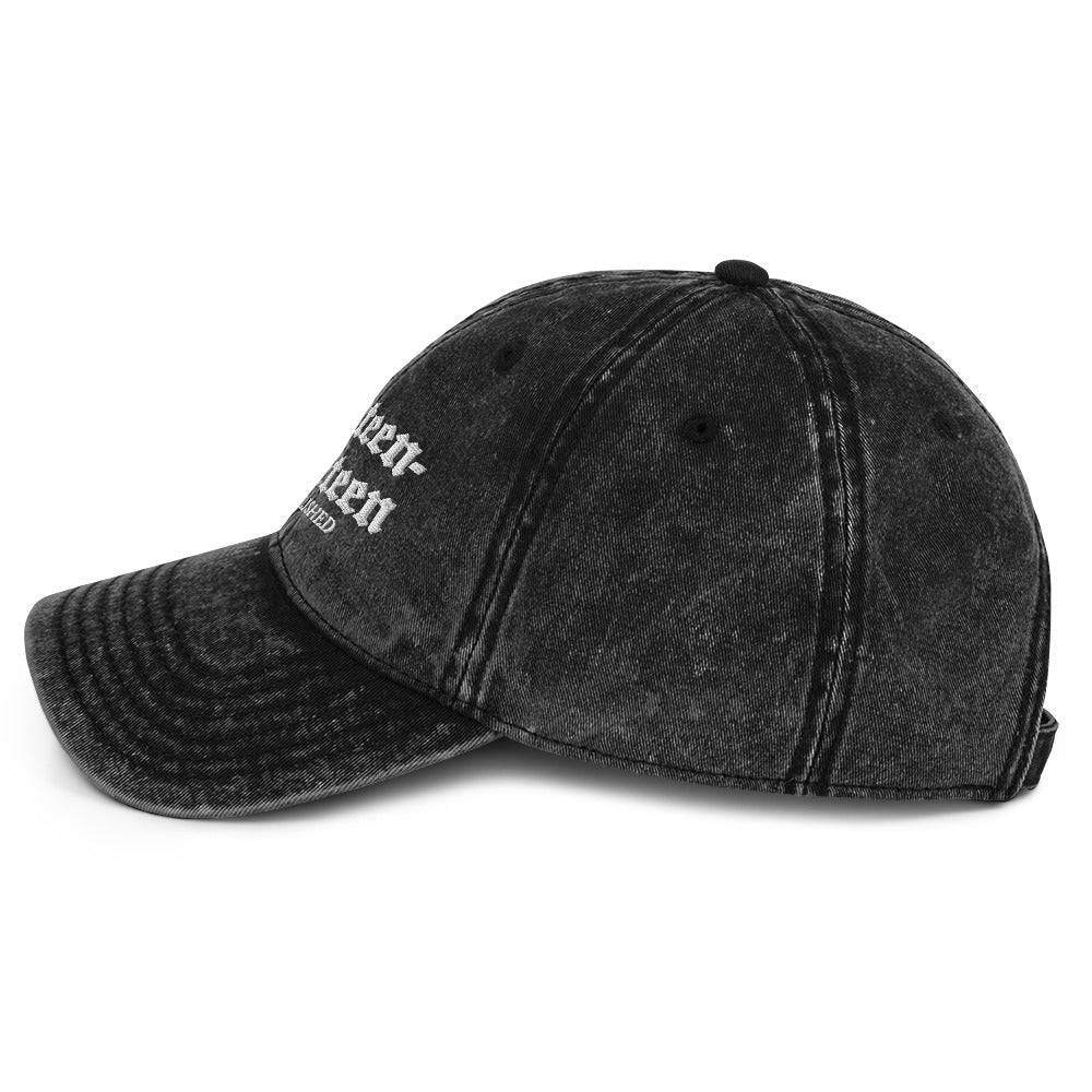 a black hat with white writing on it