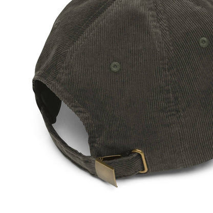 a brown hat with a gold buckle on it