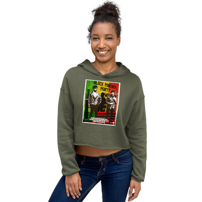 Smiling model in The Black Panther Party BPP Storefront Crop Hoodie, highlighting the cropped fit and empowering BPP graphic design.