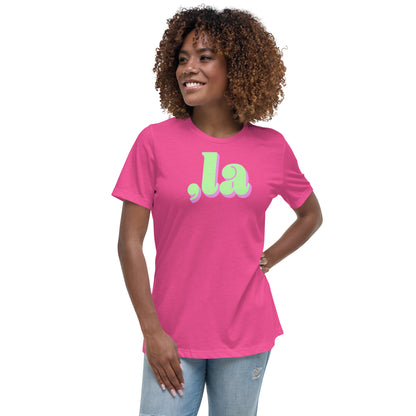 Woman in pink Comma-La Kamala Harris tee, hands on hips