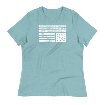 Aqua t-shirt with white protest quote and American flag graphic, casual social justice apparel, model wearing relaxed fit shirt