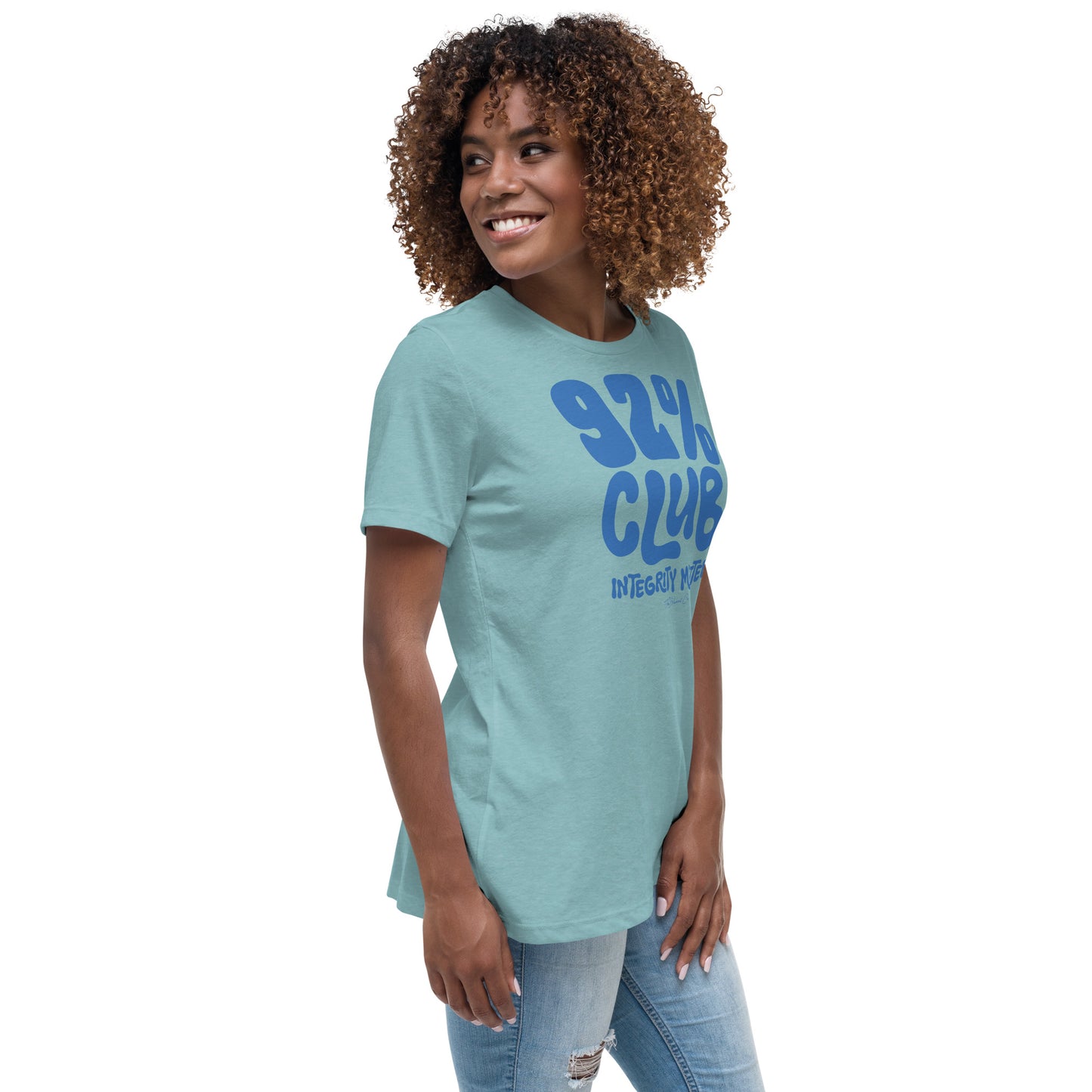 Model wearing a light aqua 92% Club Women's Relaxed T-Shirt by TheBlackest Co., featuring bold blue text '92% Club Integrity Matters.'