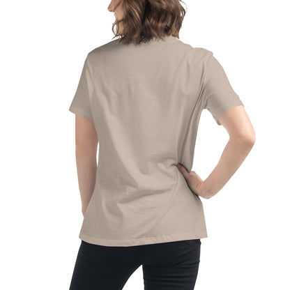 Back view of a woman wearing the ALLEY VERSION Slavery Is White History women's relaxed t-shirt in sand color. Comfortable and stylish fit.