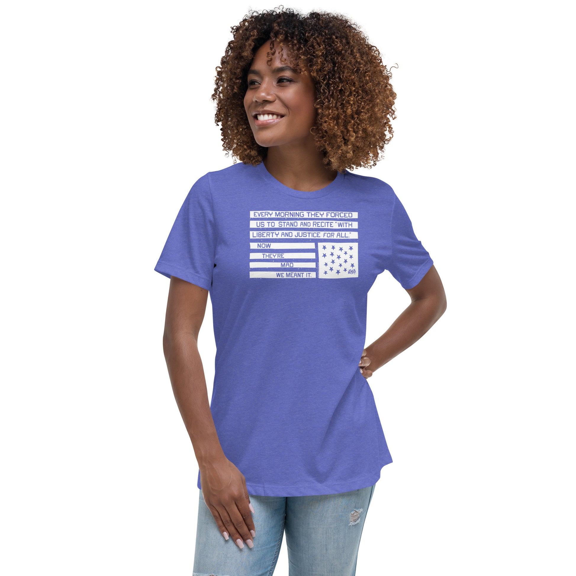 Woman wearing a blue relaxed fit protest t-shirt with quote and flag design, casual social justice apparel, model smiling