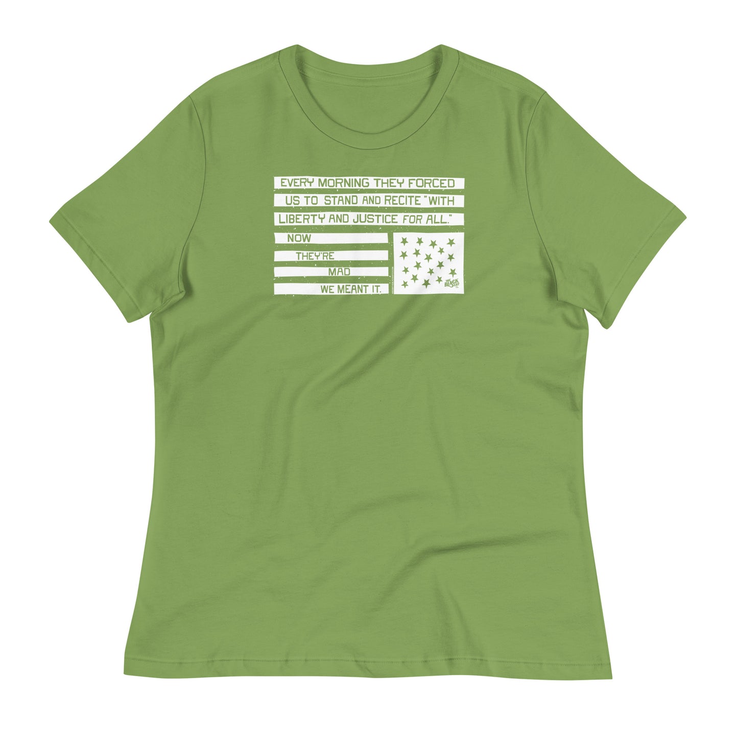 Green relaxed women's t-shirt with protest quote and star graphic, casual social justice apparel, model smiling