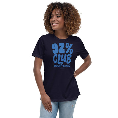 Model wearing a navy blue 92% Club Women's Relaxed T-Shirt by TheBlackest Co., featuring bold blue text '92% Club Integrity Matters.'