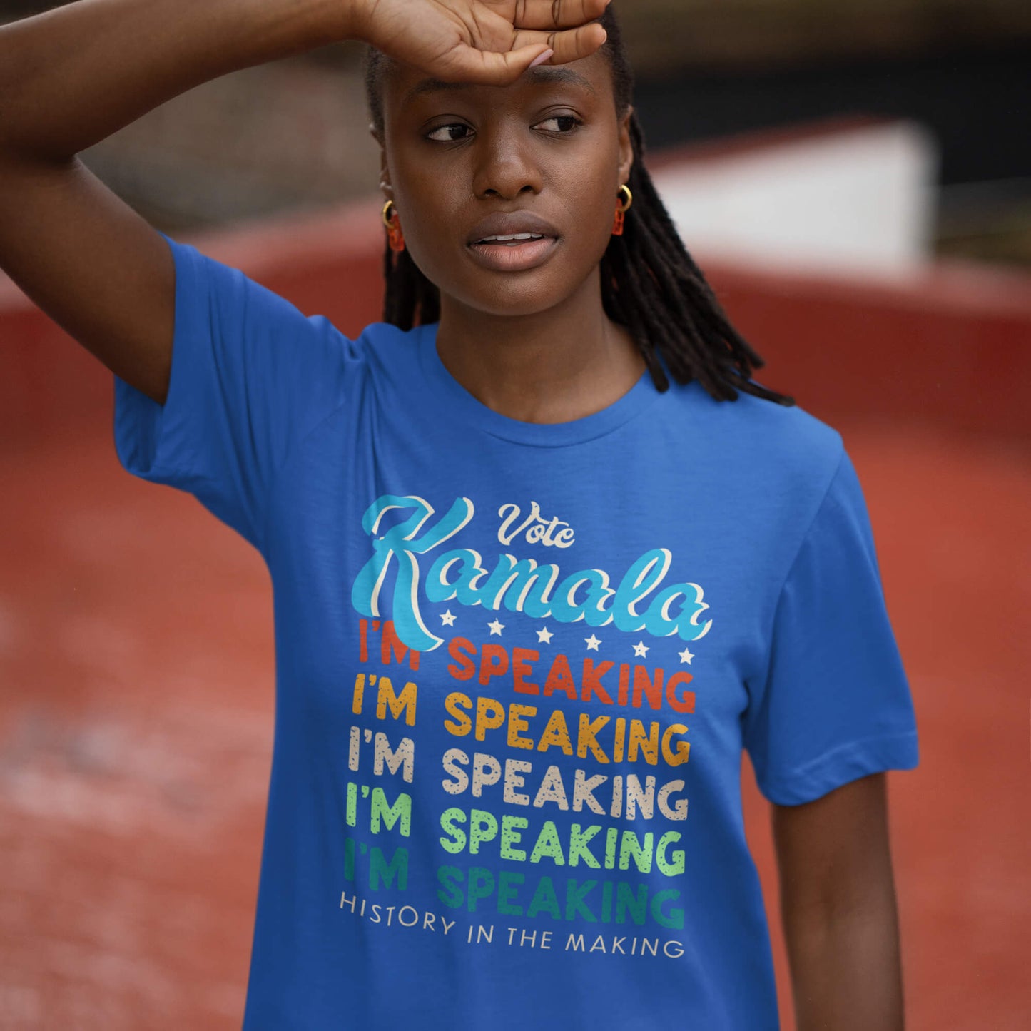 Model wearing blue Kamala I'm Speaking Harris 2024 T-Shirt