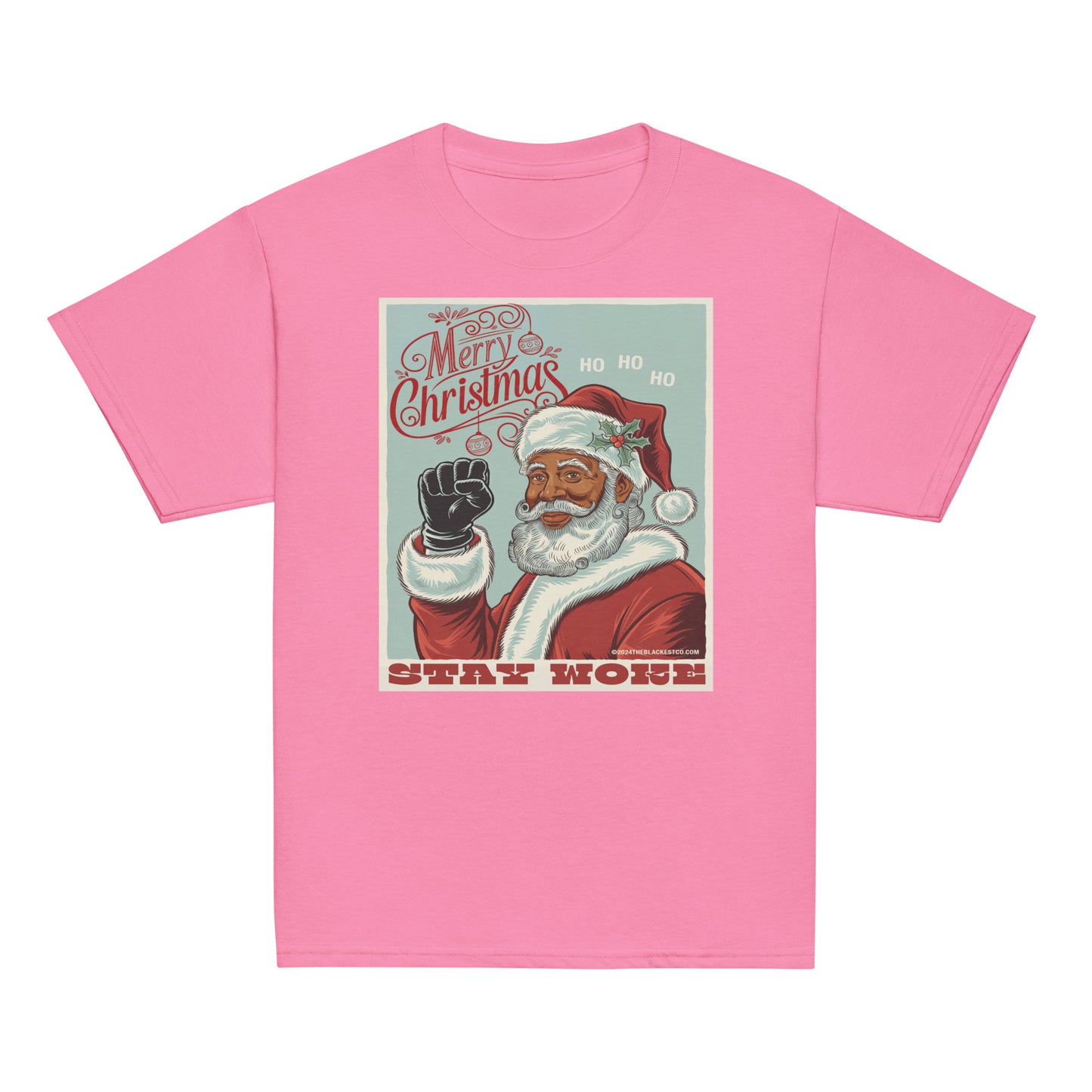 Pink youth T-shirt with a Christmas graphic featuring Santa Claus, holly, and the phrase 'Stay Woke' in bold red letters