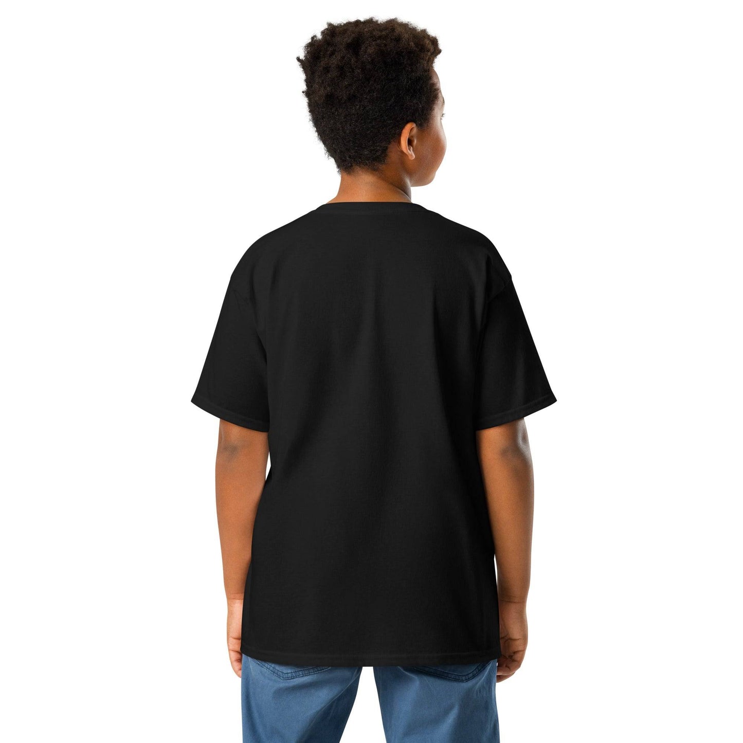 a young boy wearing a black t - shirt