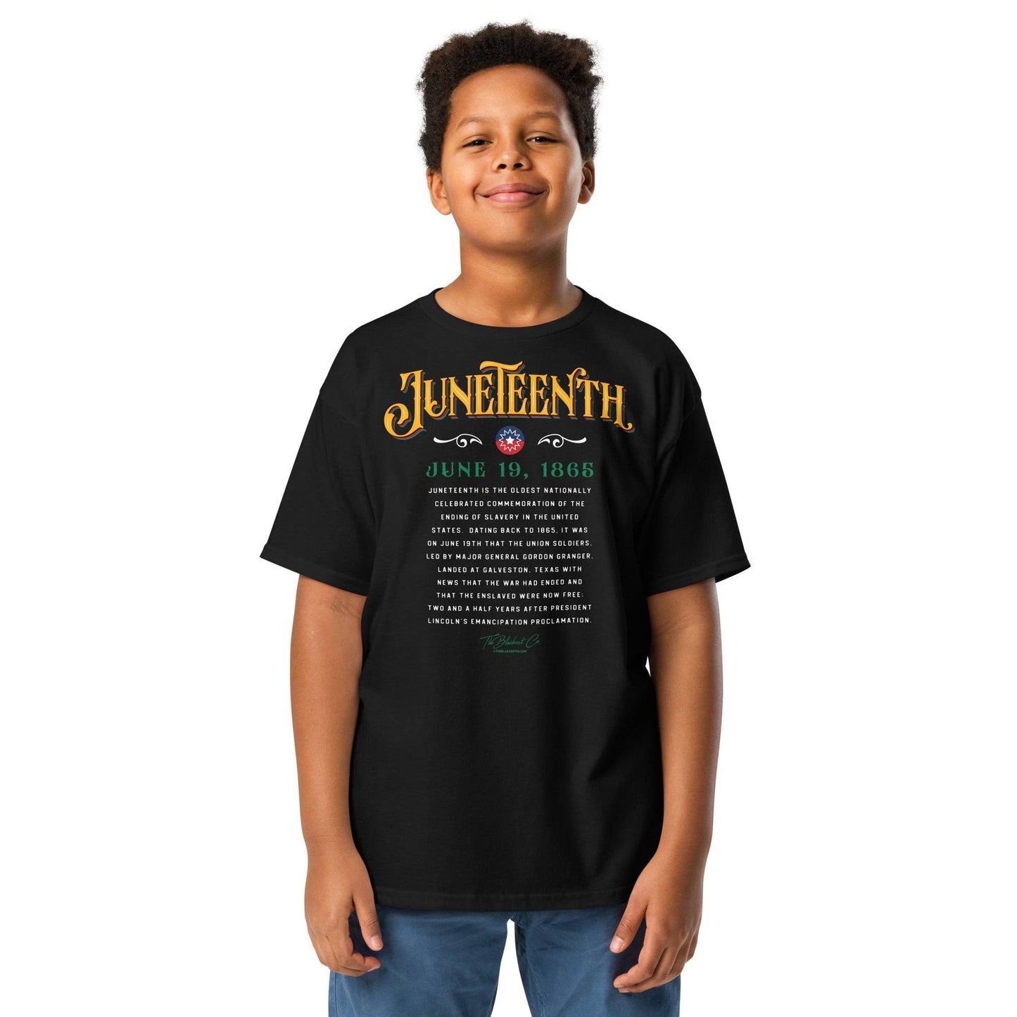 a young boy wearing a black t - shirt with the words juneteenth