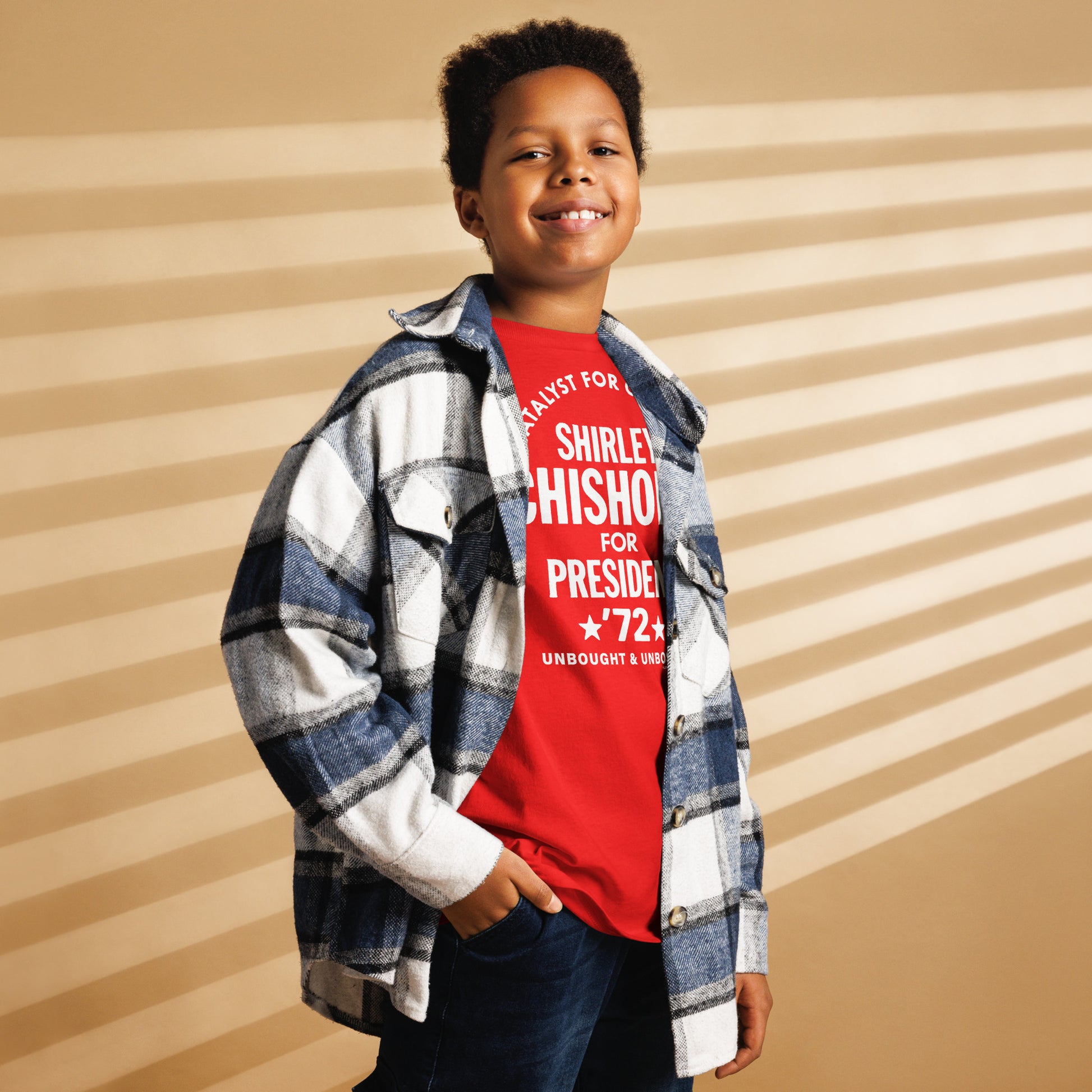 Youth wearing Shirley Chisholm For President 72 Classic Tee with flannel