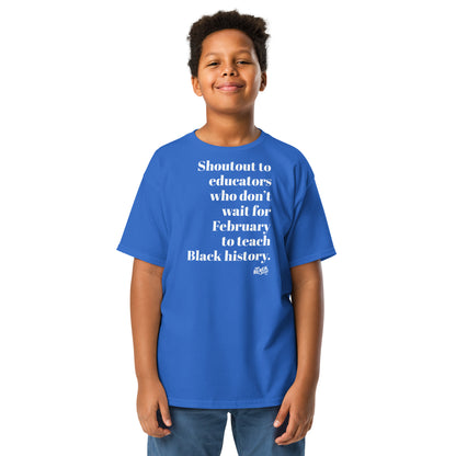 Child wearing blue Black history educator tee