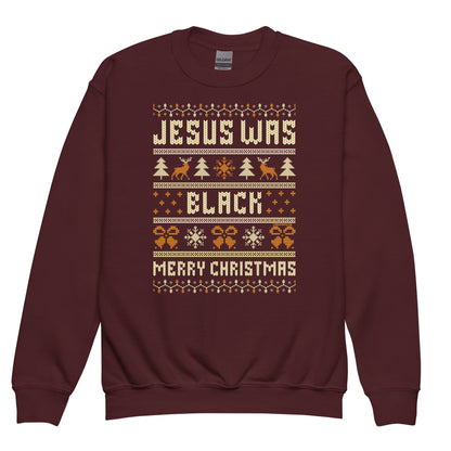 Youth Jesus Was Black Merry Christmas crewneck sweatshirt in maroon with festive holiday graphics and bold message for seasonal kids apparel.