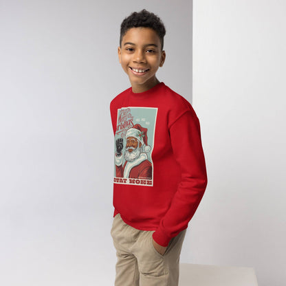 Smiling boy wearing red YOUTH Black Santa Stay Woke Crewneck Sweatshirt by TheBlackest Co., perfect for holiday youth apparel and Christmas gifts.